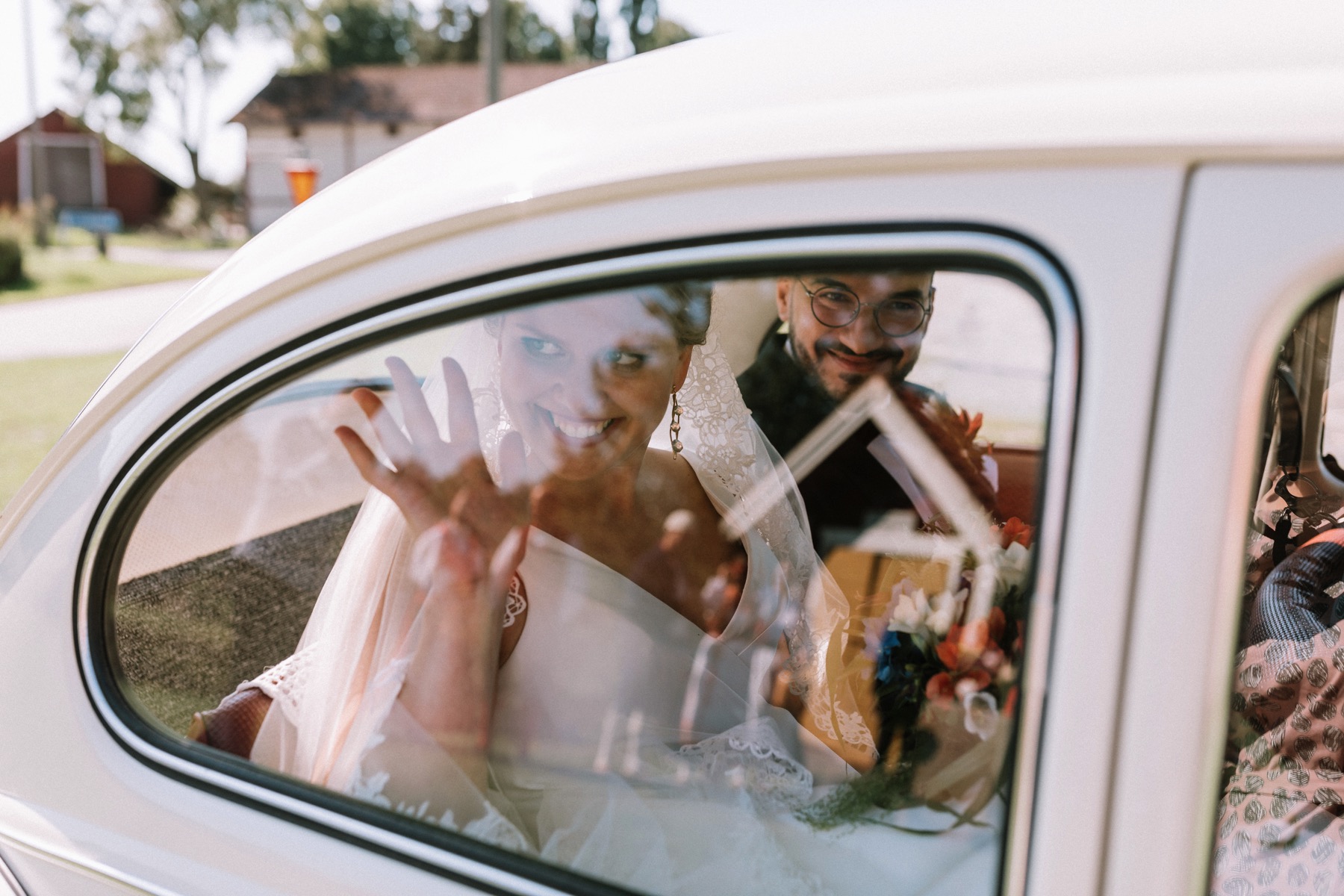 white beettle wedding car