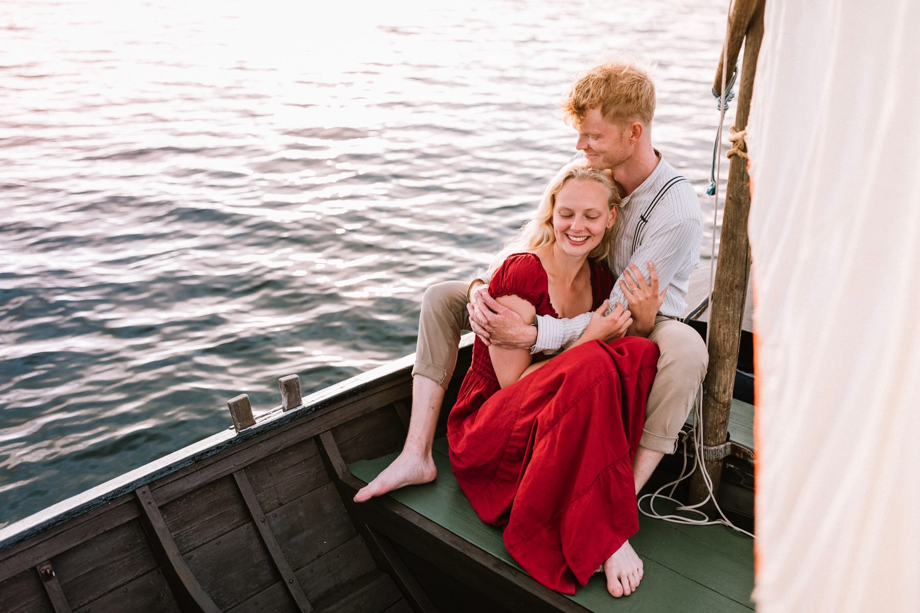 sunset engagement on a boat