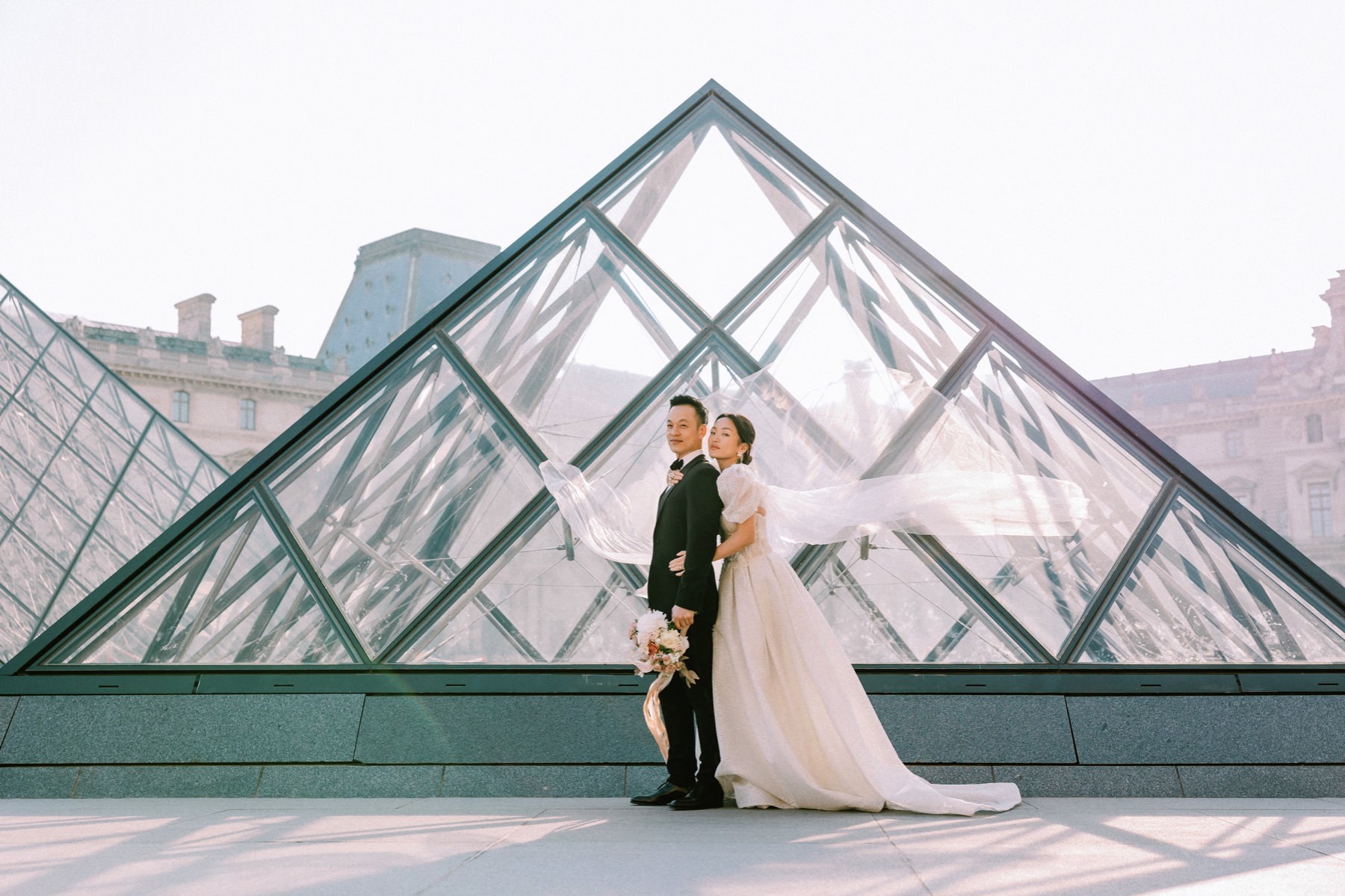 wedding couple posing for a Paris PreWedding Photographer